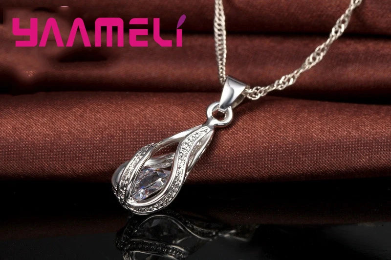 Conjunto colar e brincos gota com zircônia