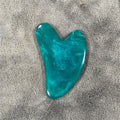 Placa gua sha de cera de abelha e pedra