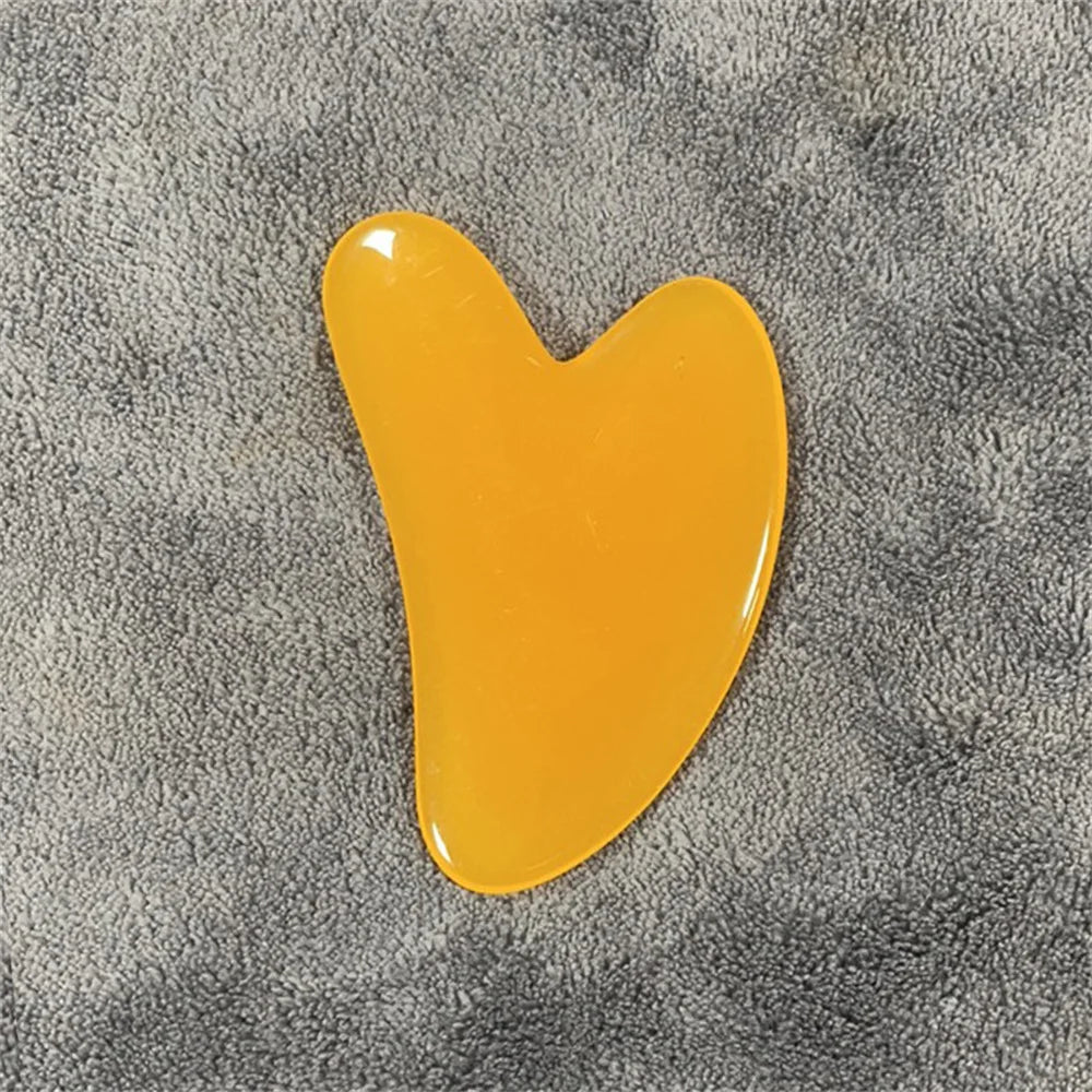 Placa gua sha de cera de abelha e pedra