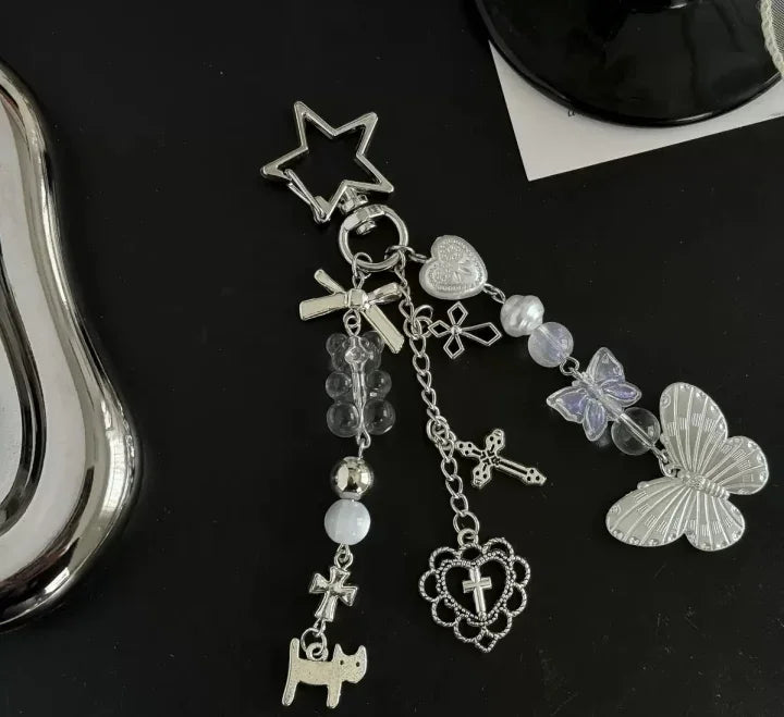 Bolsa transversal estilo Y2K com laço e pingente