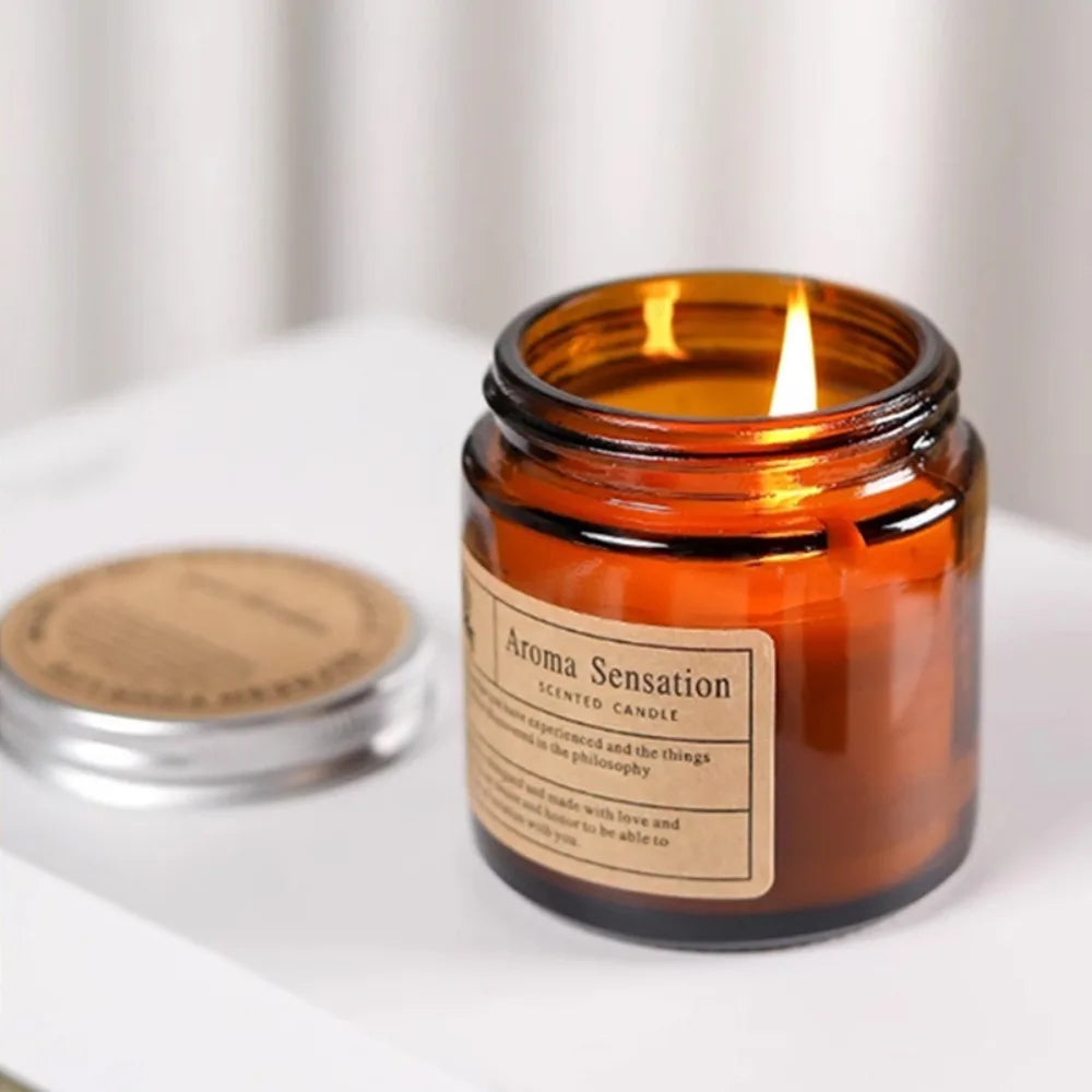 Vela aromática em copo de vidro âmbar