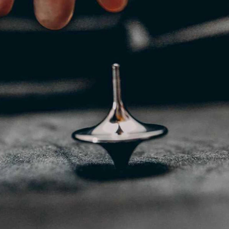 Pião de metal giratório (fidget)