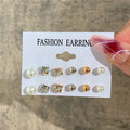 Kit de brincos argola dourados com pérolas