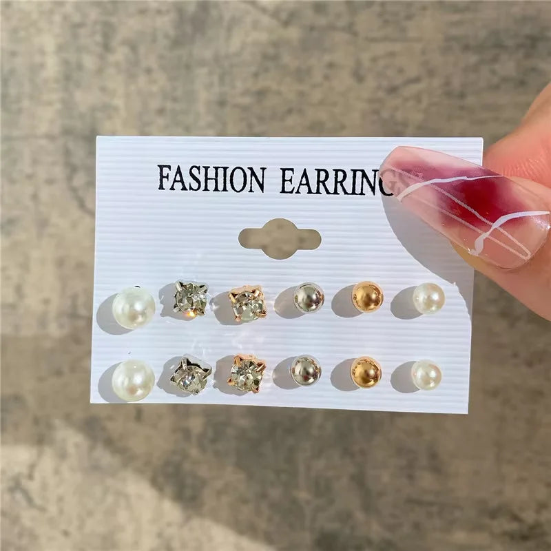 Kit de brincos argola dourados com pérolas